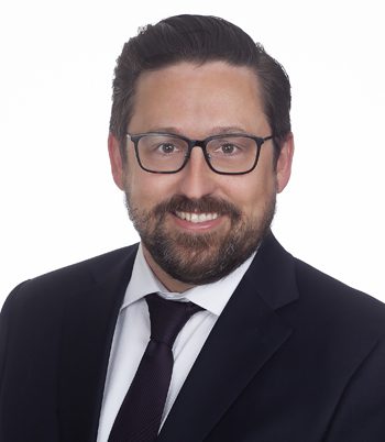 Professional headshot of attorney, Brian Hamilton