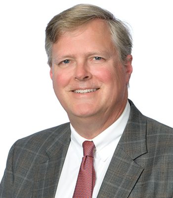 Professional headshot of attorney, John Oehmke