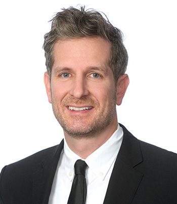 Professional headshot of attorney, Andrew Skanchy